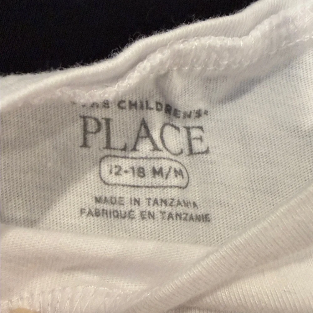 Four Long Sleeved The Children’s Place Shirts in Solid Black and White 12-18 Mos